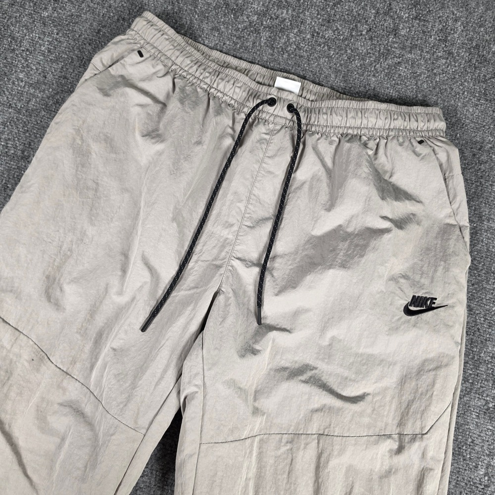Nike Tech Essentials Commuter Pants Mens XL Gray Lined Nylon Joggers Sportswear